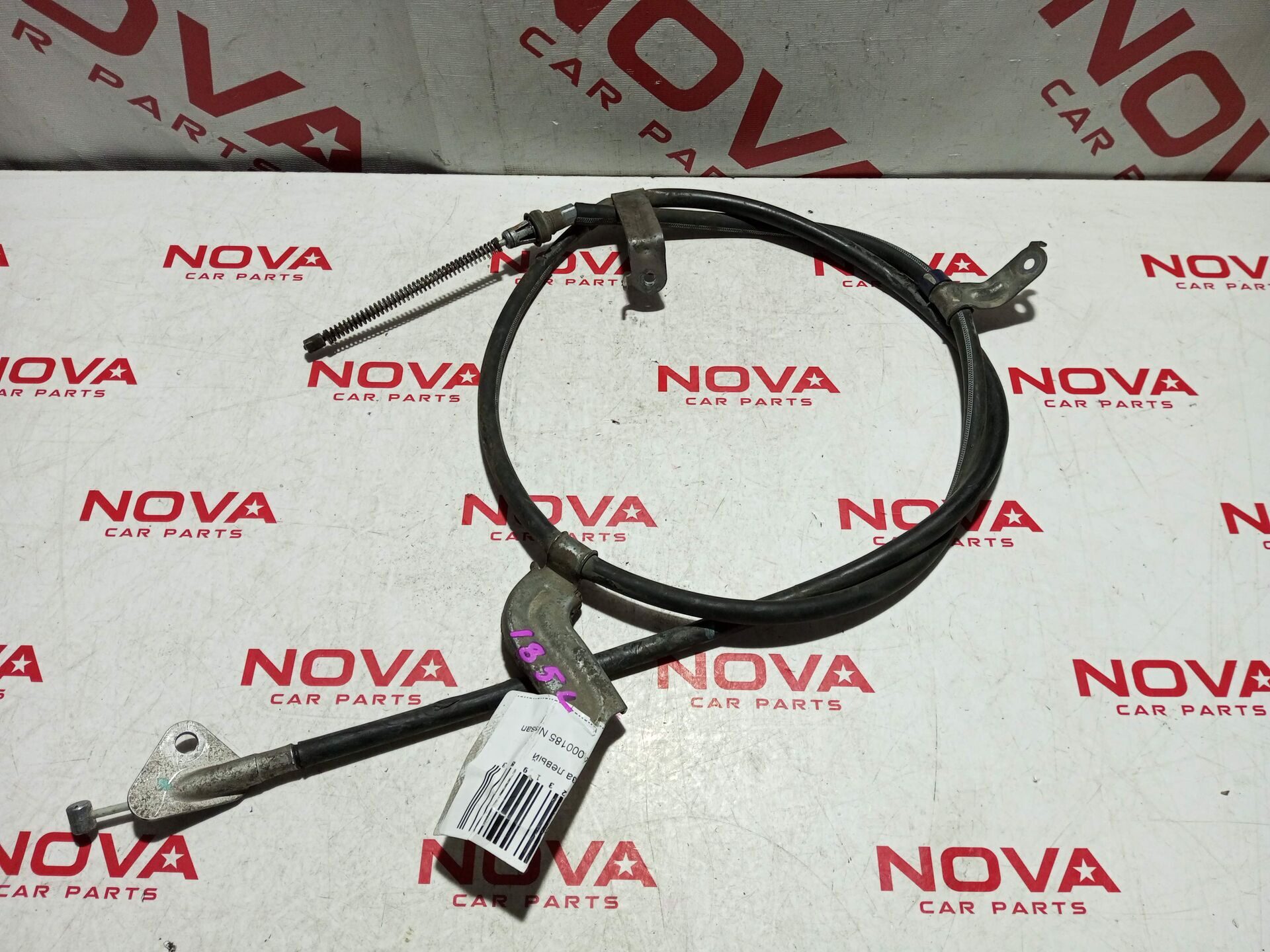 Трос ручного тормоза левый Nissan Note 365313AY0A 2 поколение хэтчбек E12-052141